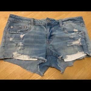 Distressed stretch shorts